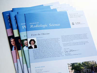 Photograph of a stack of newsletters for the UNC’s Department of Allied Health Sciences all with Carolina blue and each with a different secondary color. Photography and text are included.