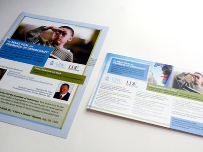 Conference materials for UNC-Chapel Hill's School of Law's Center for Civili Rights use Carolina blue and a soft, clear grass green. A photograph of a young African-American boy saluting is prominent, with a quote from Martin Luther King and conference information also pictured.